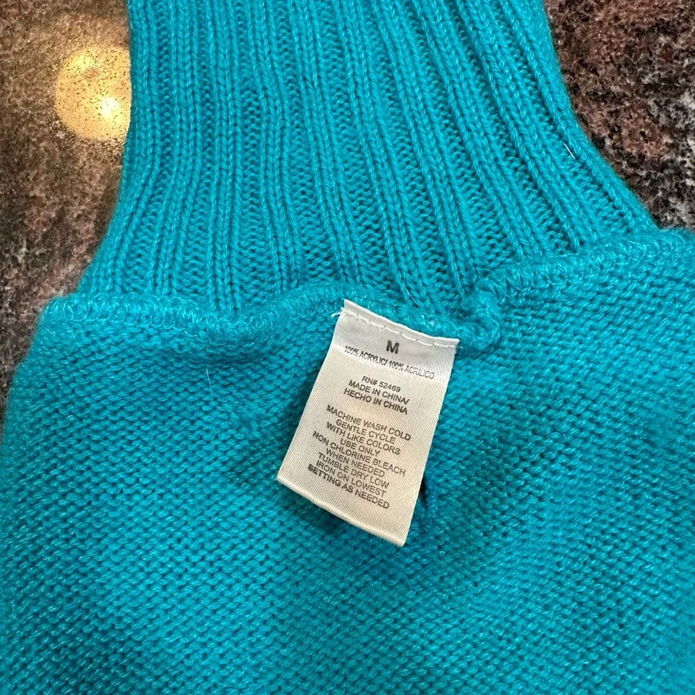 Teal colored dog sweater size M